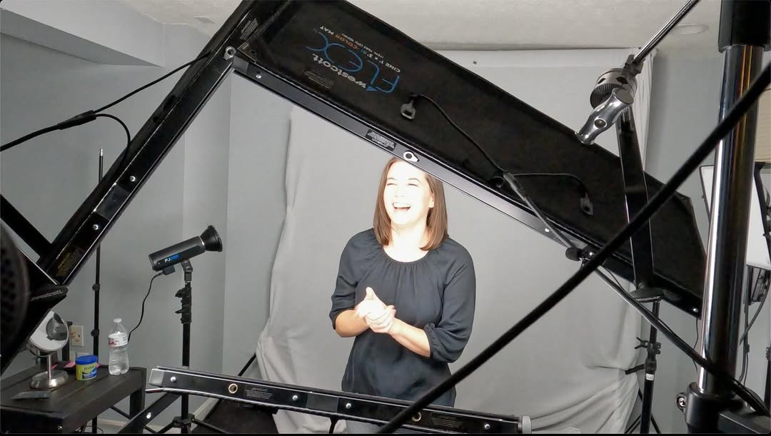 A woman getting her headshot taken.