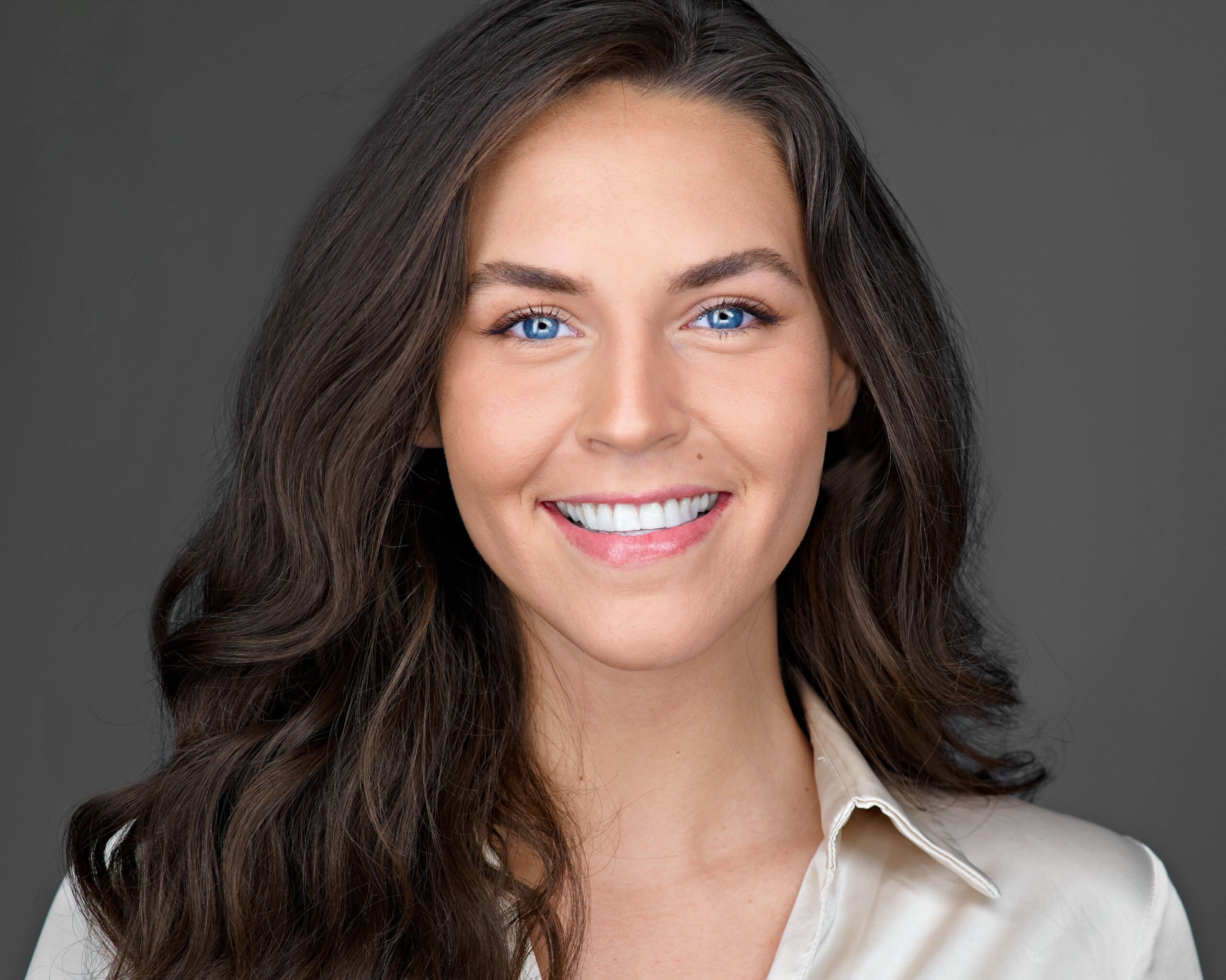 Female in a model headshot